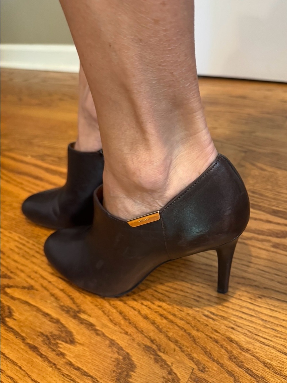 Coach Dark Brown Leather Ankle Booties with Gold Accent - Picture 12 of 12